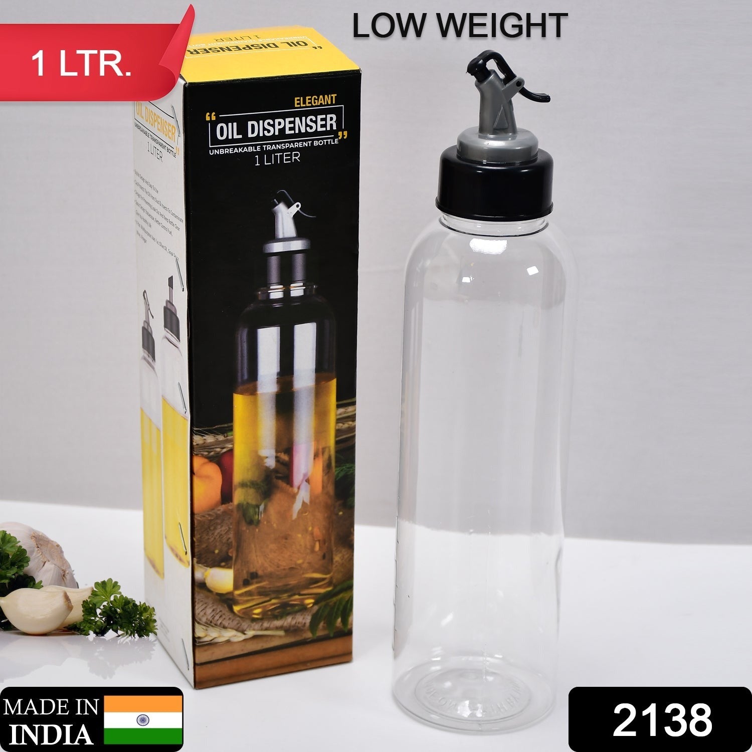 Clear oil dispenser with lid and controlled spout Clear oil dispenser with lid and controlled spout